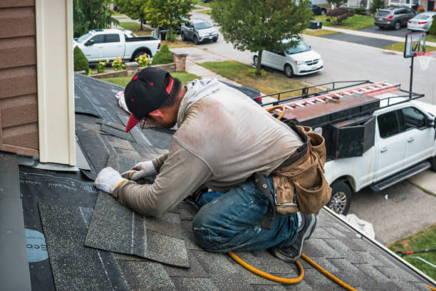 Professional Roofing technician working in Wyoming, RI